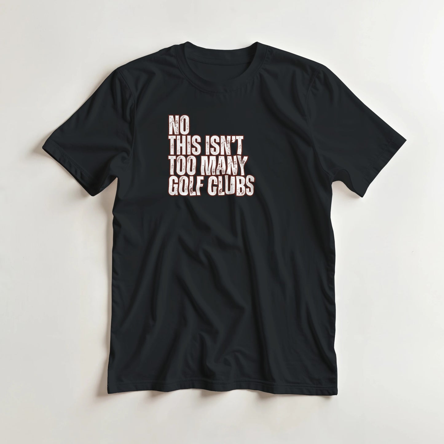 Too Many T-Shirt in Black S lying on a plain floor. T-shirt is a unisex cut and 100 per cent cotton.