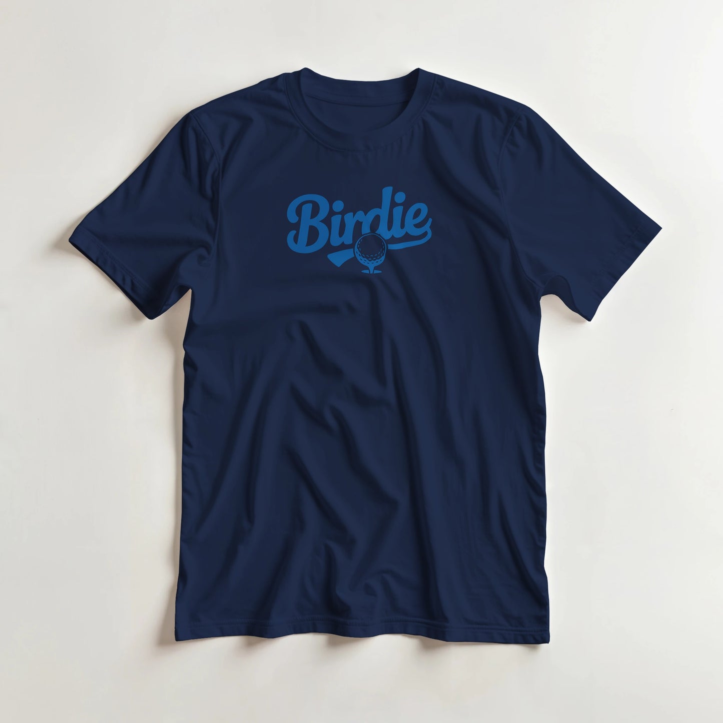 Birdie T-Shirt in Navy lying on a plain floor. T-shirt is a unisex cut and 100 per cent cotton.