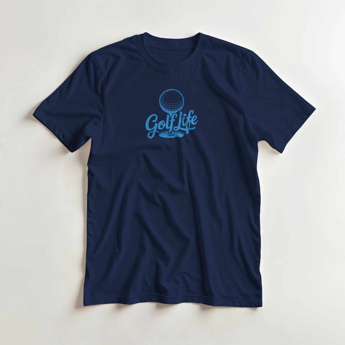 Golf Life T-Shirt in Navy M lying on a plain floor. T-shirt is a unisex cut and 100 per cent cotton.
