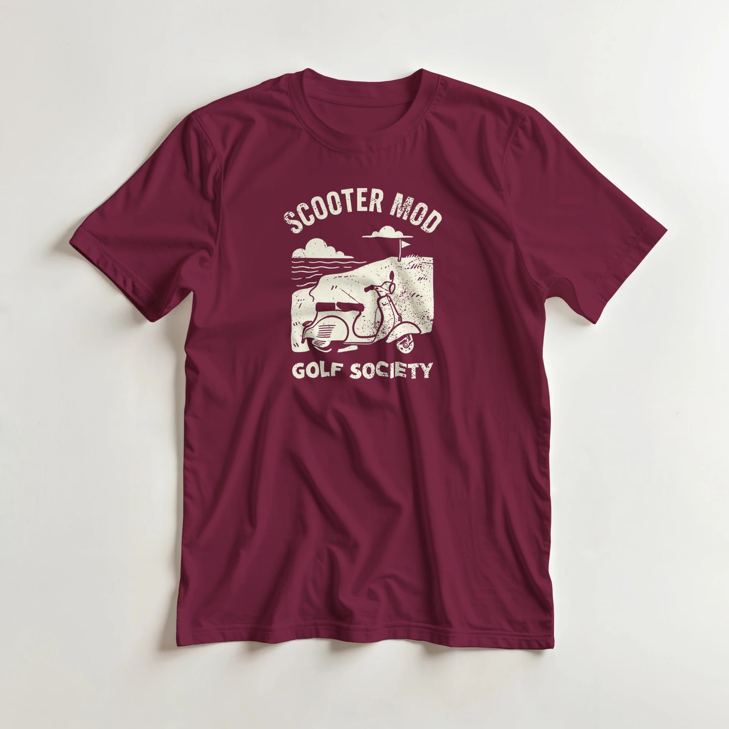 Scooter Mod T-Shirt in Maroon lying on a plain floor. T-shirt is a unisex cut and 100 per cent cotton.