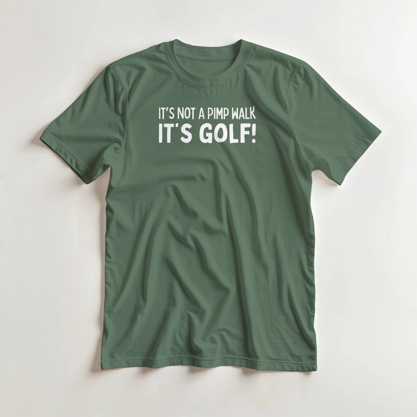 Not A Pimp Walk T-Shirt in Military Green lying on a plain floor. T-shirt is a unisex cut and 100 per cent cotton.