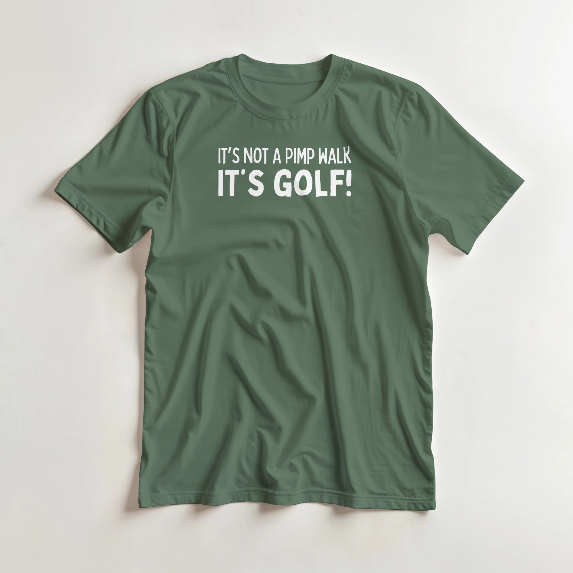 Not A Pimp Walk T-Shirt in Military Green lying on a plain floor. T-shirt is a unisex cut and 100 per cent cotton.