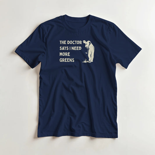 More Greens T-Shirt in Navy lying on a plain floor. T-shirt is a unisex cut and 100 per cent cotton.