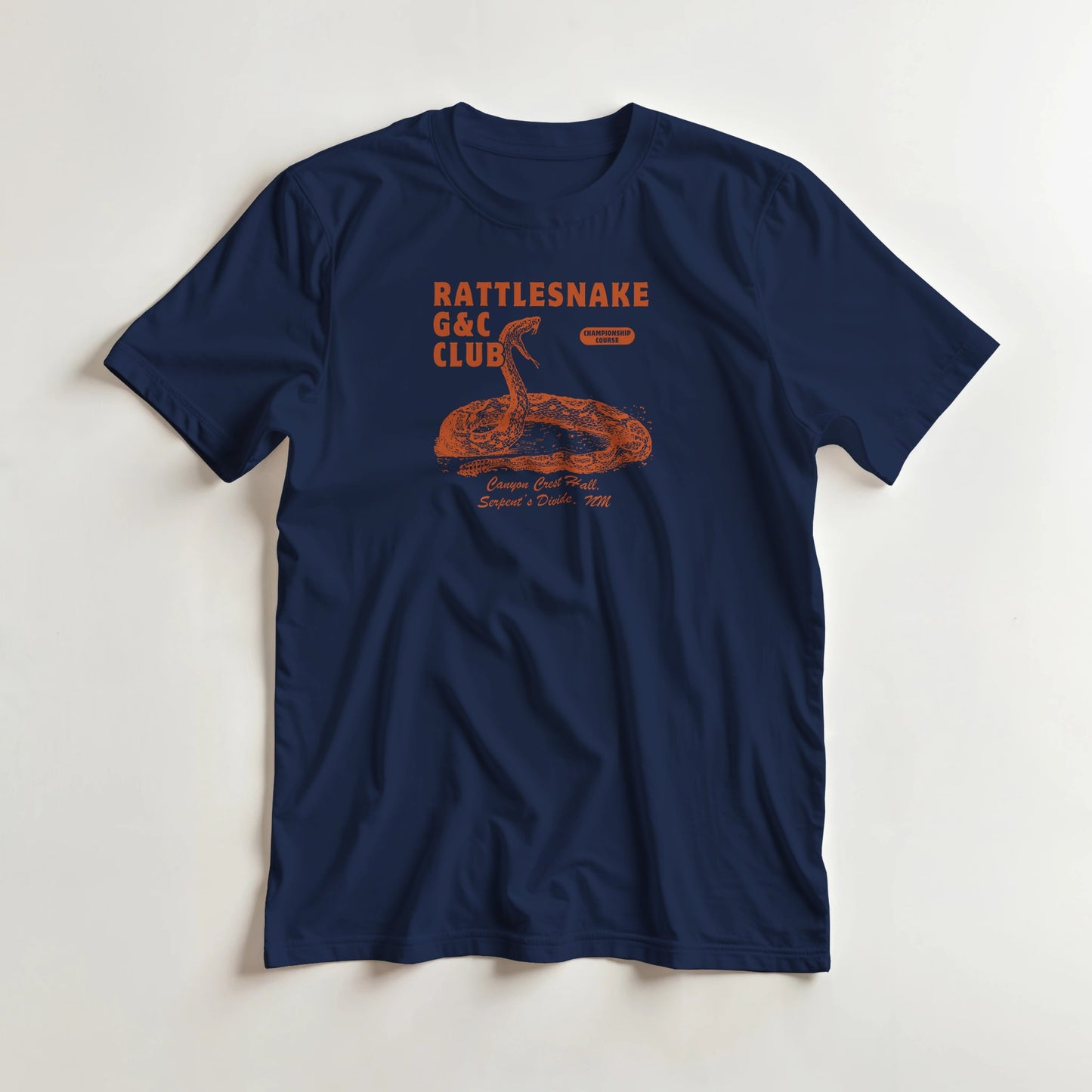 Rattlesnake G&C T-Shirt in Navy 2XL lying on a plain floor. T-shirt is a unisex cut and 100 per cent cotton.