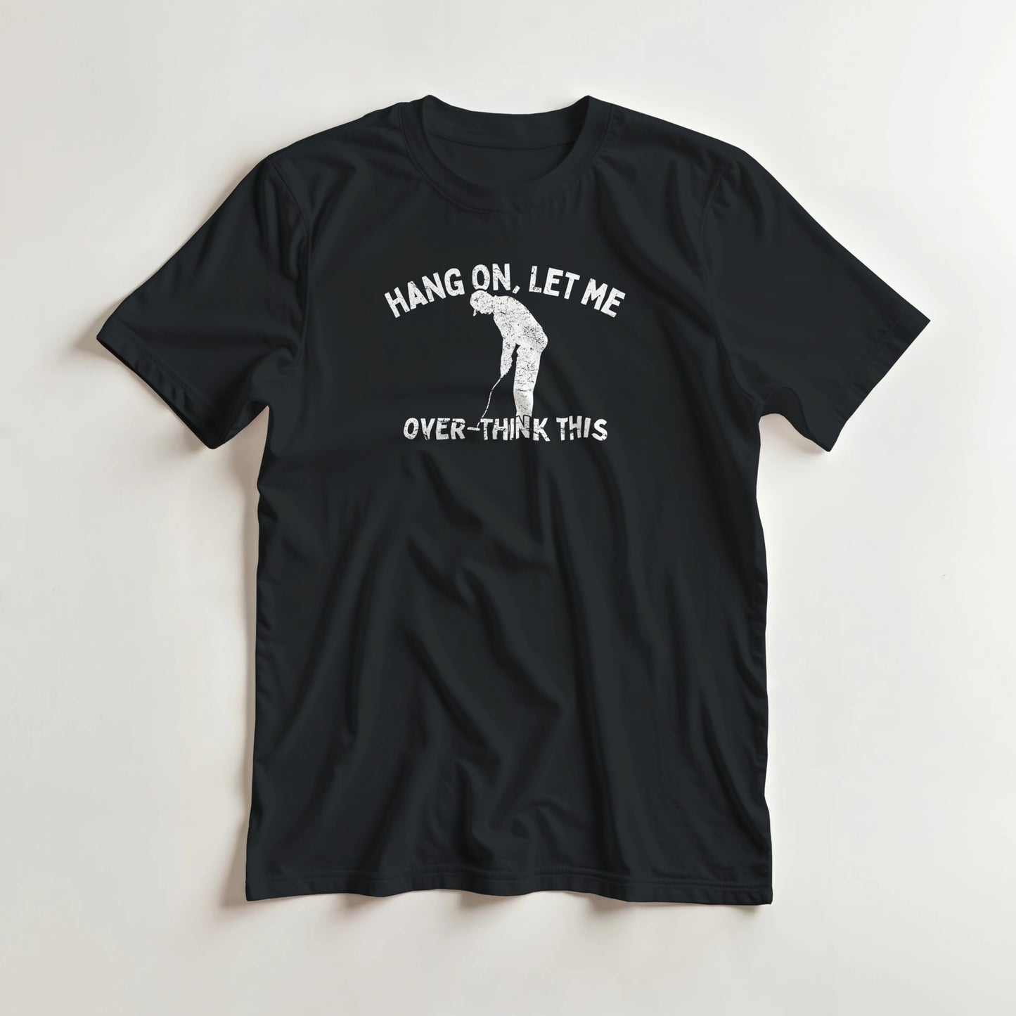 Over-Think T-Shirt in Black XL lying on a plain floor. T-shirt is a unisex cut and 100 per cent cotton.