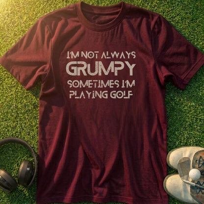 Grumpy Golf T-Shirt in lying on a plain floor. T-shirt is a unisex cut and 100 per cent cotton.