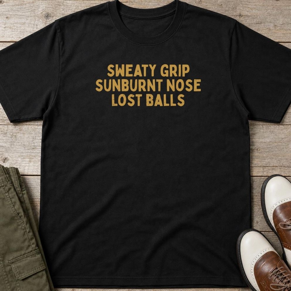 Sweaty Grip T-Shirt in Black lying on a plain floor. T-shirt is a unisex cut and 100 per cent cotton.