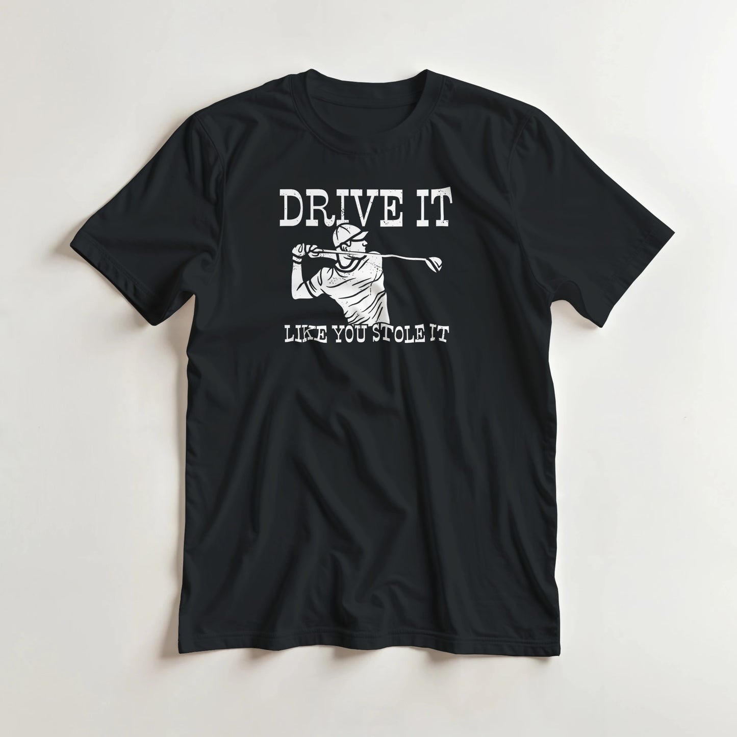 Stole It T-Shirt in Black lying on a plain floor. T-shirt is a unisex cut and 100 per cent cotton.