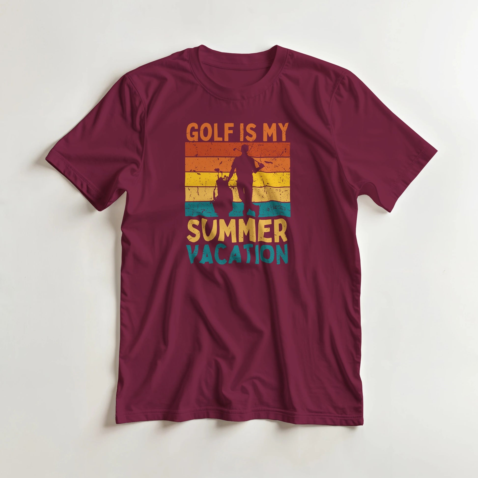 Summer Vacation T-Shirt in Maroon lying on a plain floor. T-shirt is a unisex cut and 100 per cent cotton.