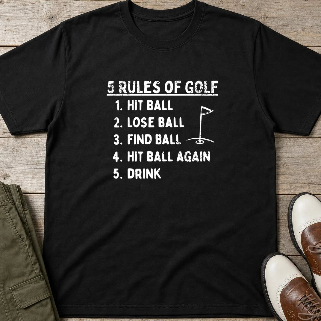 5 Rules T-Shirt in Black lying on a plain floor. T-shirt is a unisex cut and 100 per cent cotton.