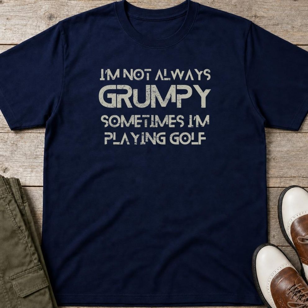 Grumpy Golf T-Shirt in Navy lying on a plain floor. T-shirt is a unisex cut and 100 per cent cotton.