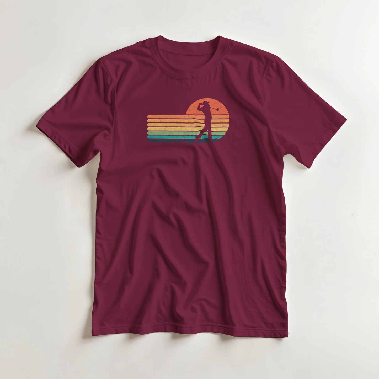 Vintage Golfer T-Shirt in Maroon XL lying on a plain floor. T-shirt is a unisex cut and 100 per cent cotton.