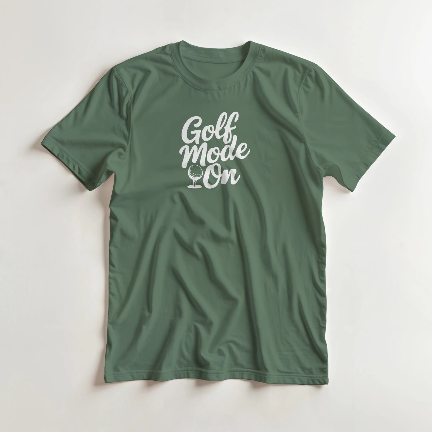 Mode T-Shirt in Military Green S lying on a plain floor. T-shirt is a unisex cut and 100 per cent cotton.