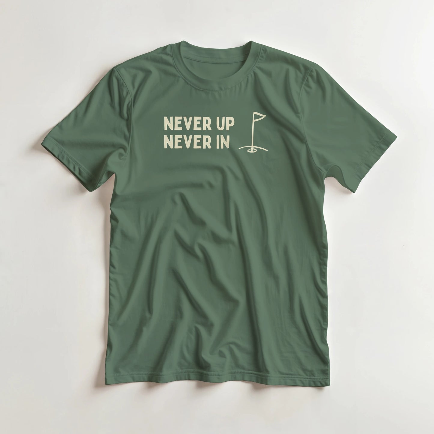 Never Up T-Shirt in Military Green 2XL lying on a plain floor. T-shirt is a unisex cut and 100 per cent cotton.