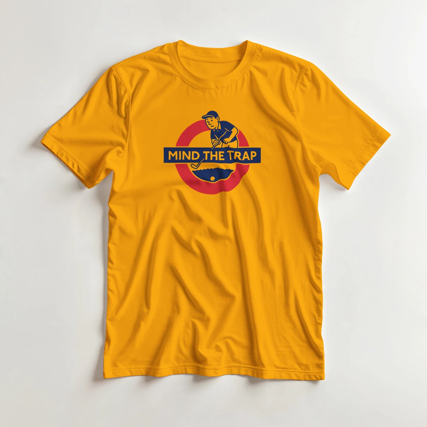 Mind The Trap T-Shirt in Gold 2XL lying on a plain floor. T-shirt is a unisex cut and 100 per cent cotton.