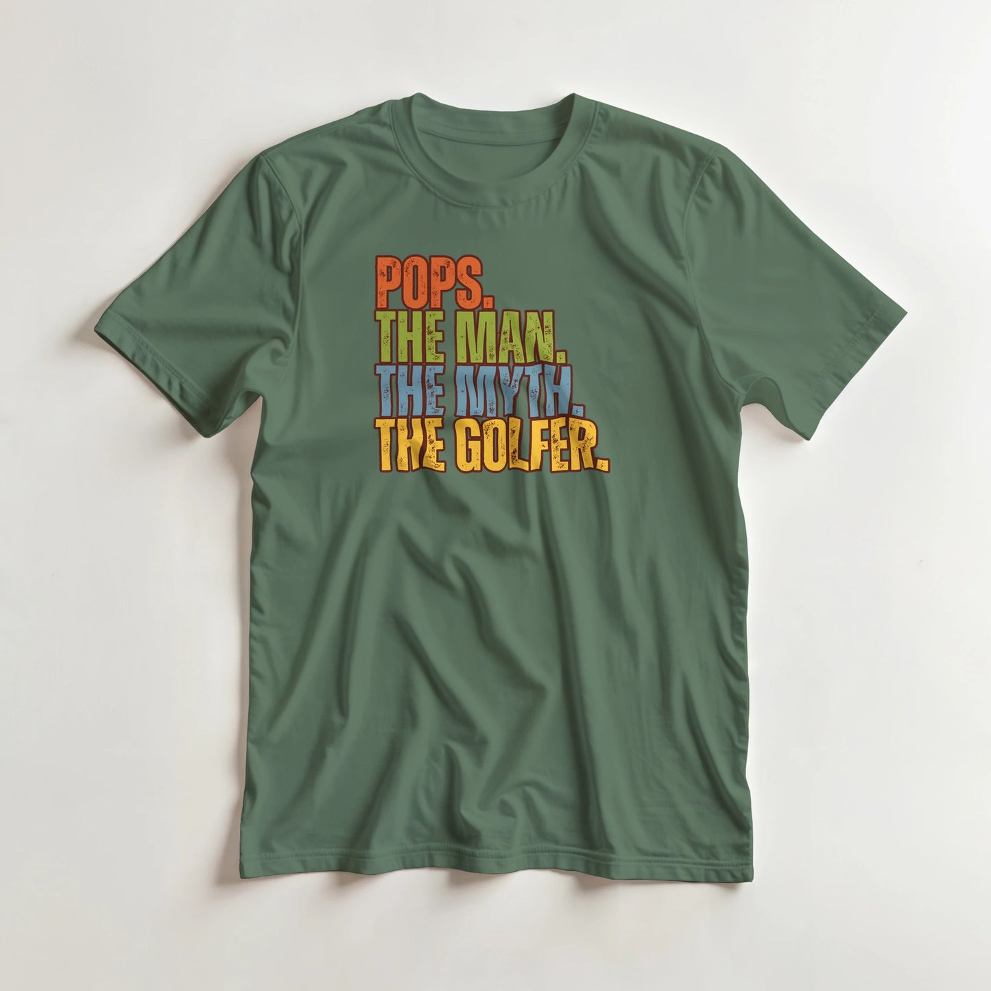 Pops Myth Golfer T-Shirt in Military Green lying on a plain floor. T-shirt is a unisex cut and 100 per cent cotton.