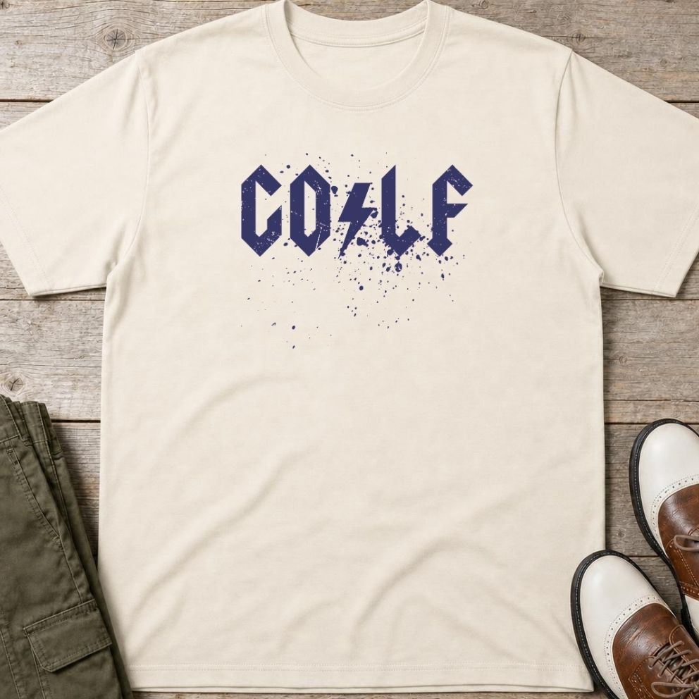 Golf Spray T-Shirt in Natural lying on a plain floor. T-shirt is a unisex cut and 100 per cent cotton.