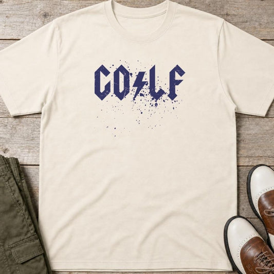 Golf Spray T-Shirt in Natural lying on a plain floor. T-shirt is a unisex cut and 100 per cent cotton.