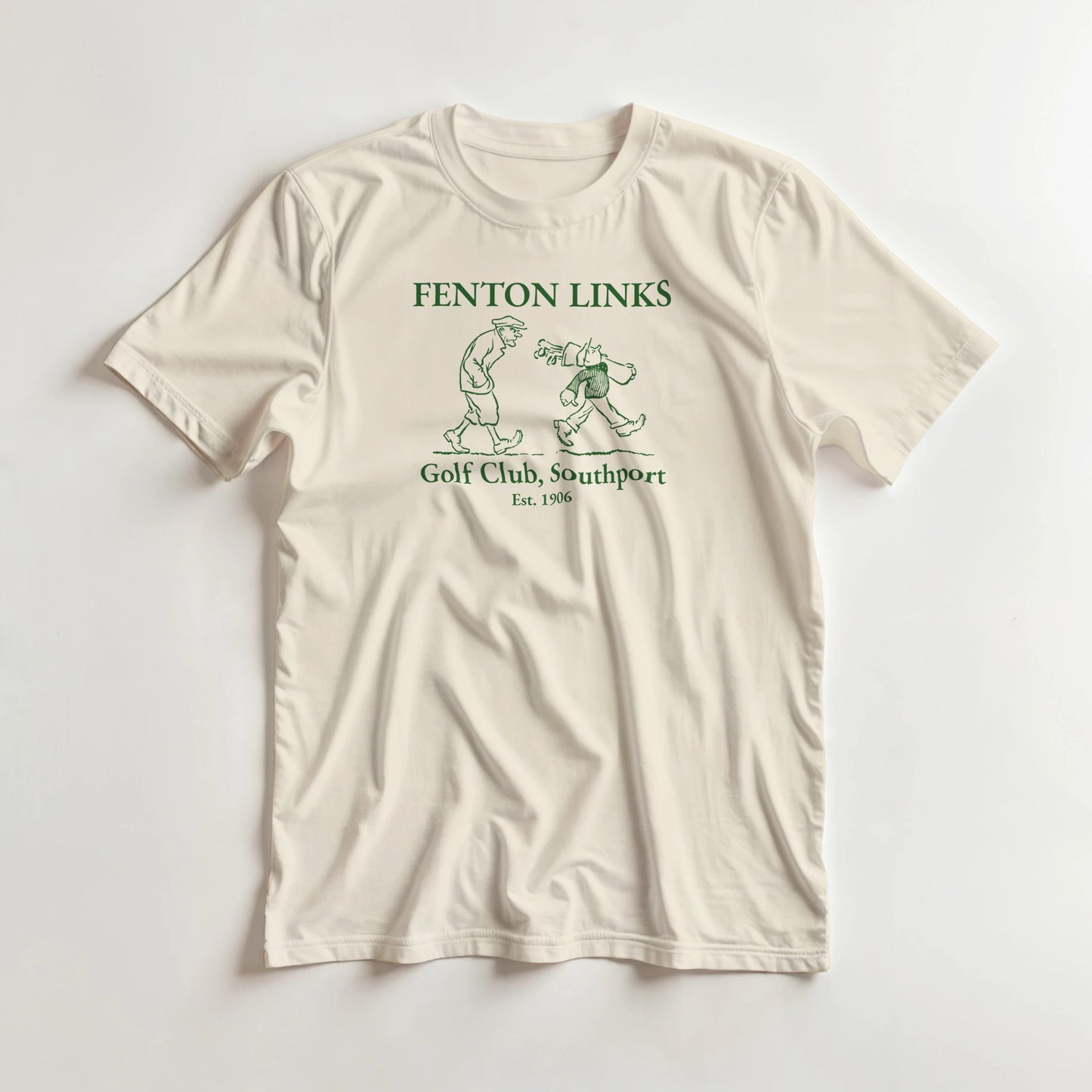 Fenton Links T-Shirt in Natural lying on a plain floor. T-shirt is a unisex cut and 100 per cent cotton.