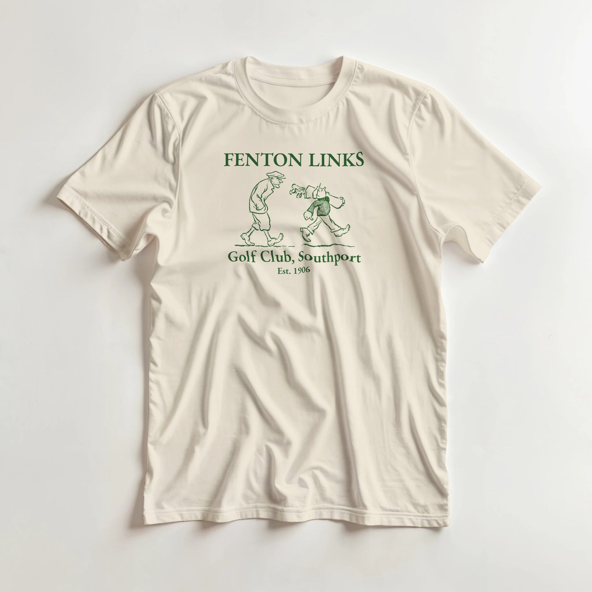 Fenton Links T-Shirt in Natural lying on a plain floor. T-shirt is a unisex cut and 100 per cent cotton.