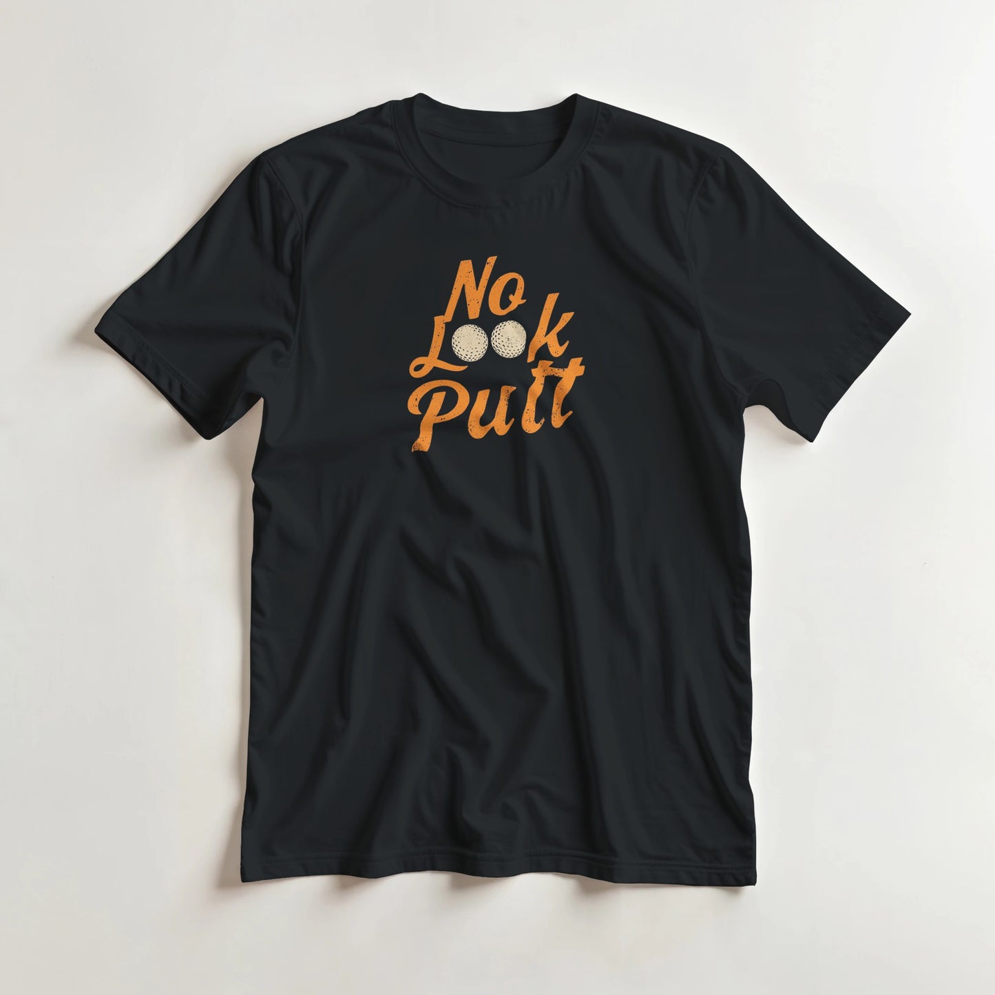 No Look T-Shirt in Black lying on a plain floor. T-shirt is a unisex cut and 100 per cent cotton.