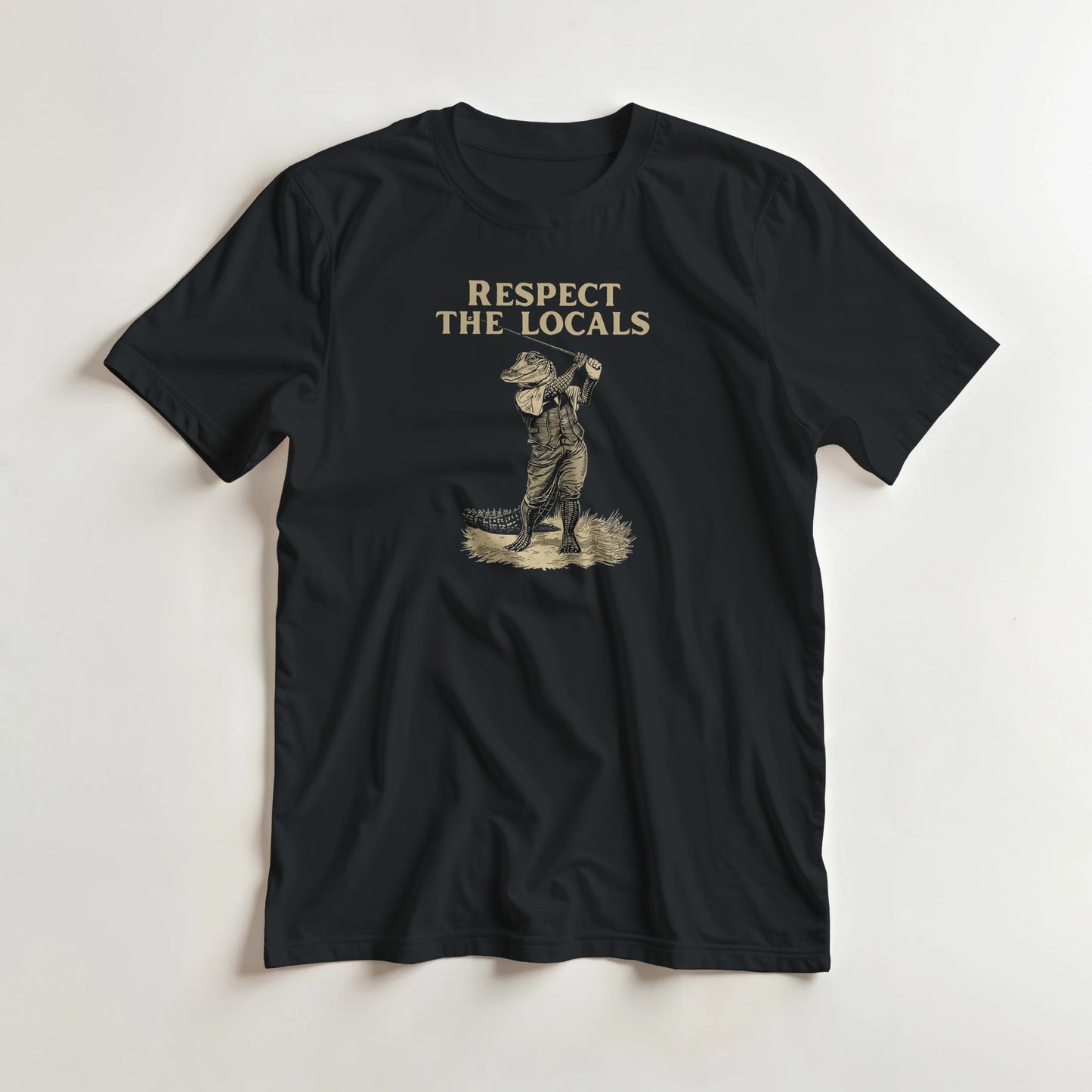 Respect The Locals T-Shirt in M lying on a plain floor. T-shirt is a unisex cut and 100 per cent cotton.