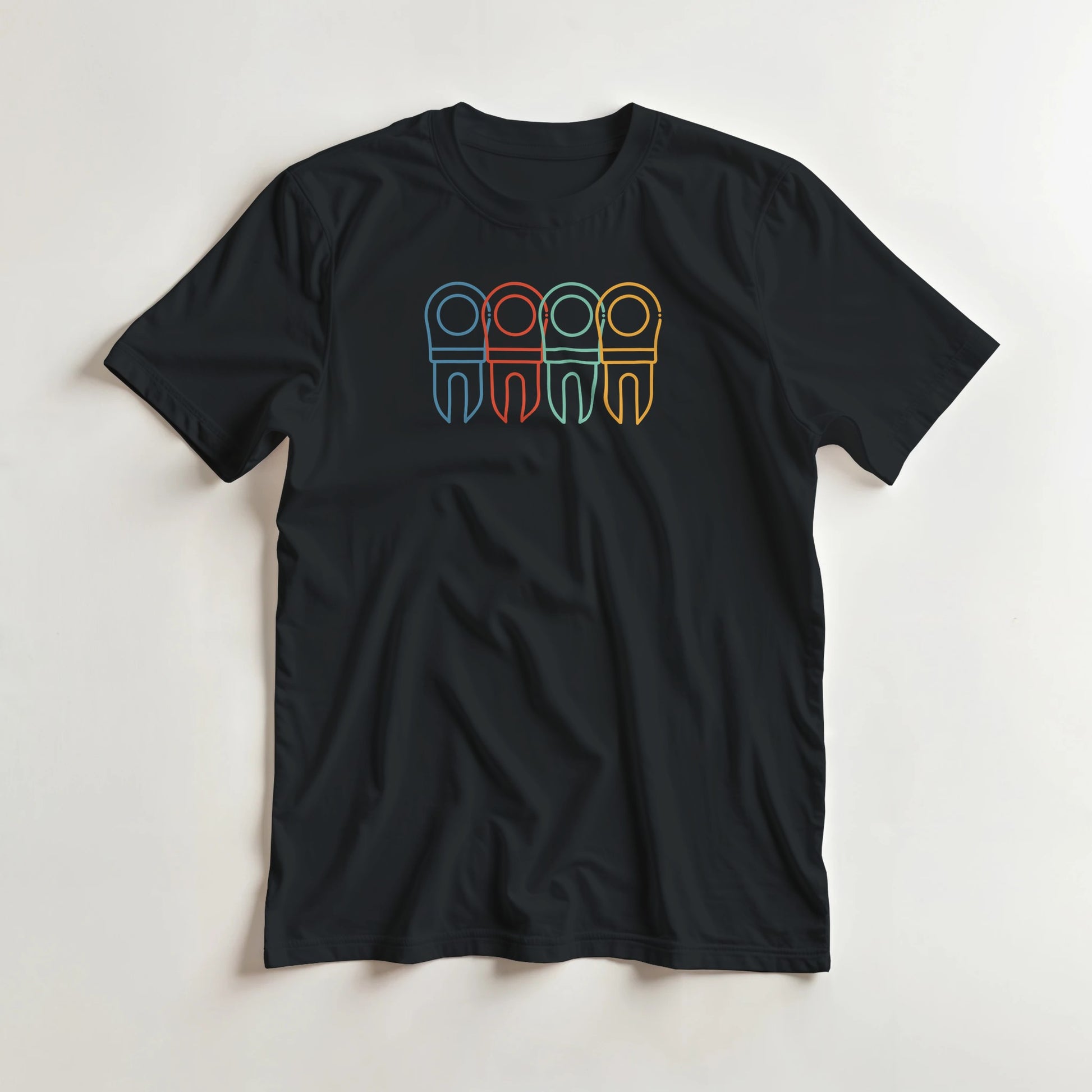 Divot Rainbow T-Shirt in Black S lying on a plain floor. T-shirt is a unisex cut and 100 per cent cotton.