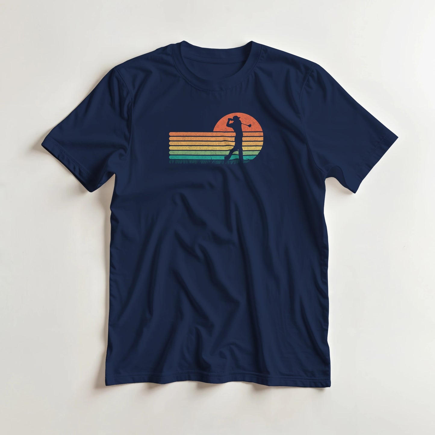 Vintage Golfer T-Shirt in Navy M lying on a plain floor. T-shirt is a unisex cut and 100 per cent cotton.