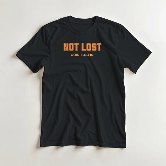 Not Lost T-Shirt in Black lying on a plain floor. T-shirt is a unisex cut and 100 per cent cotton.