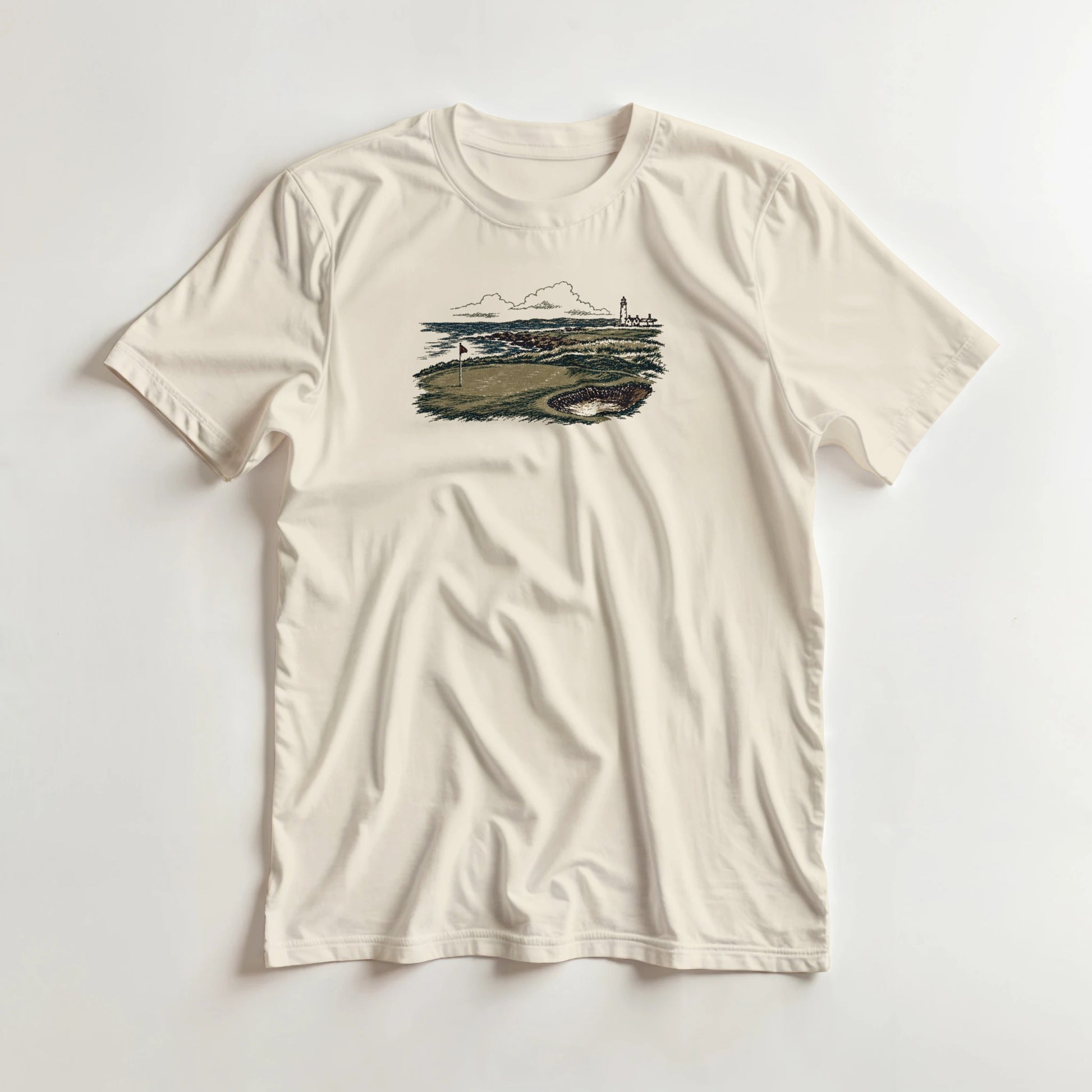 The Links T-Shirt in lying on a plain floor. T-shirt is a unisex cut and 100 per cent cotton.
