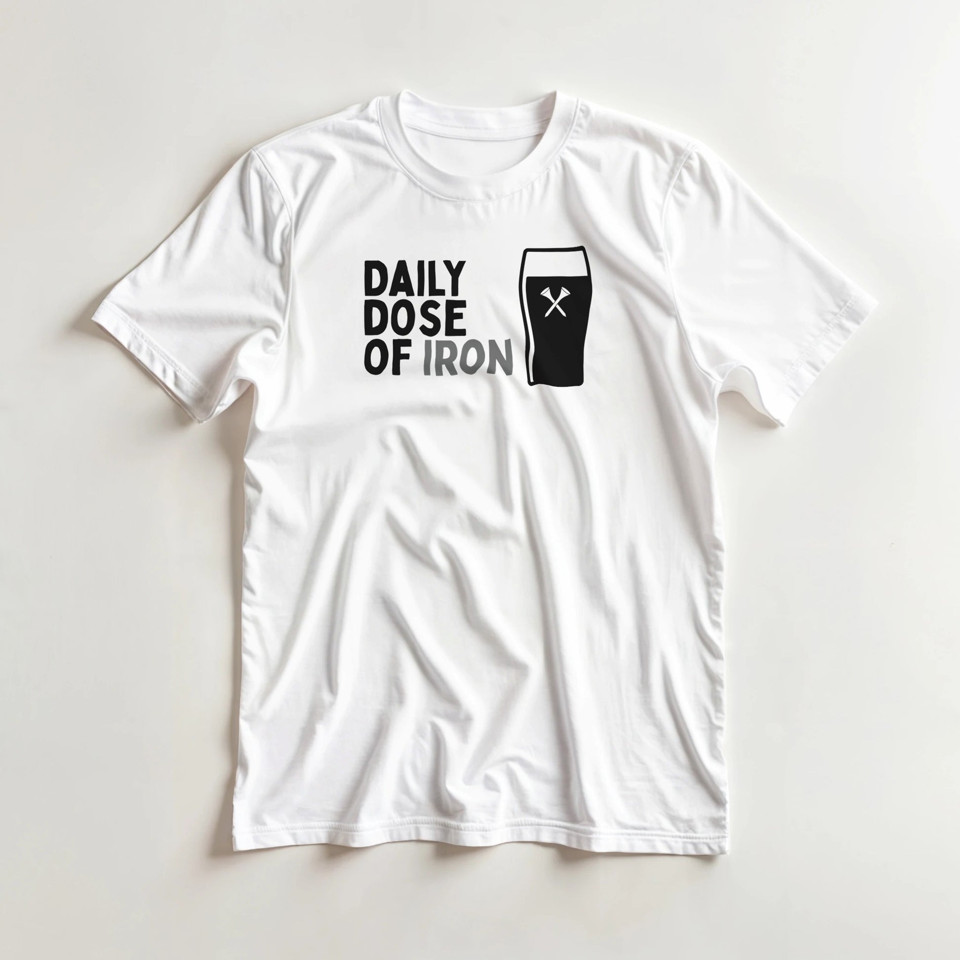 Dose Of Iron T-Shirt in White lying on a plain floor. T-shirt is a unisex cut and 100 per cent cotton.