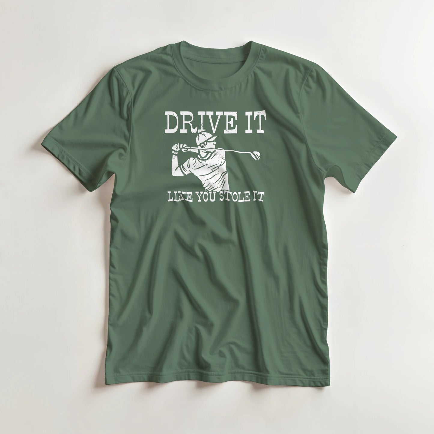 Stole It T-Shirt in Military Green lying on a plain floor. T-shirt is a unisex cut and 100 per cent cotton.