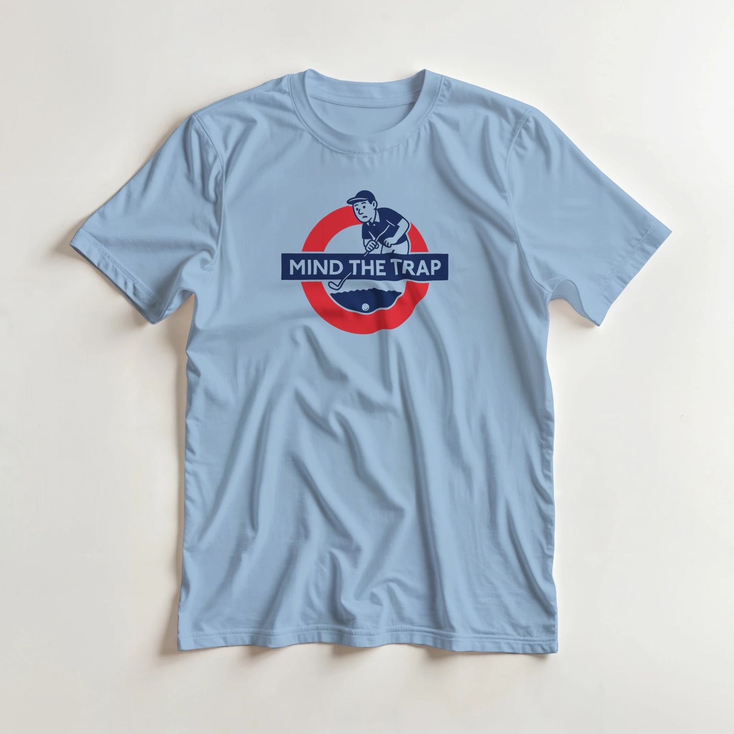 Mind The Trap T-Shirt in Light Blue 3XL lying on a plain floor. T-shirt is a unisex cut and 100 per cent cotton.