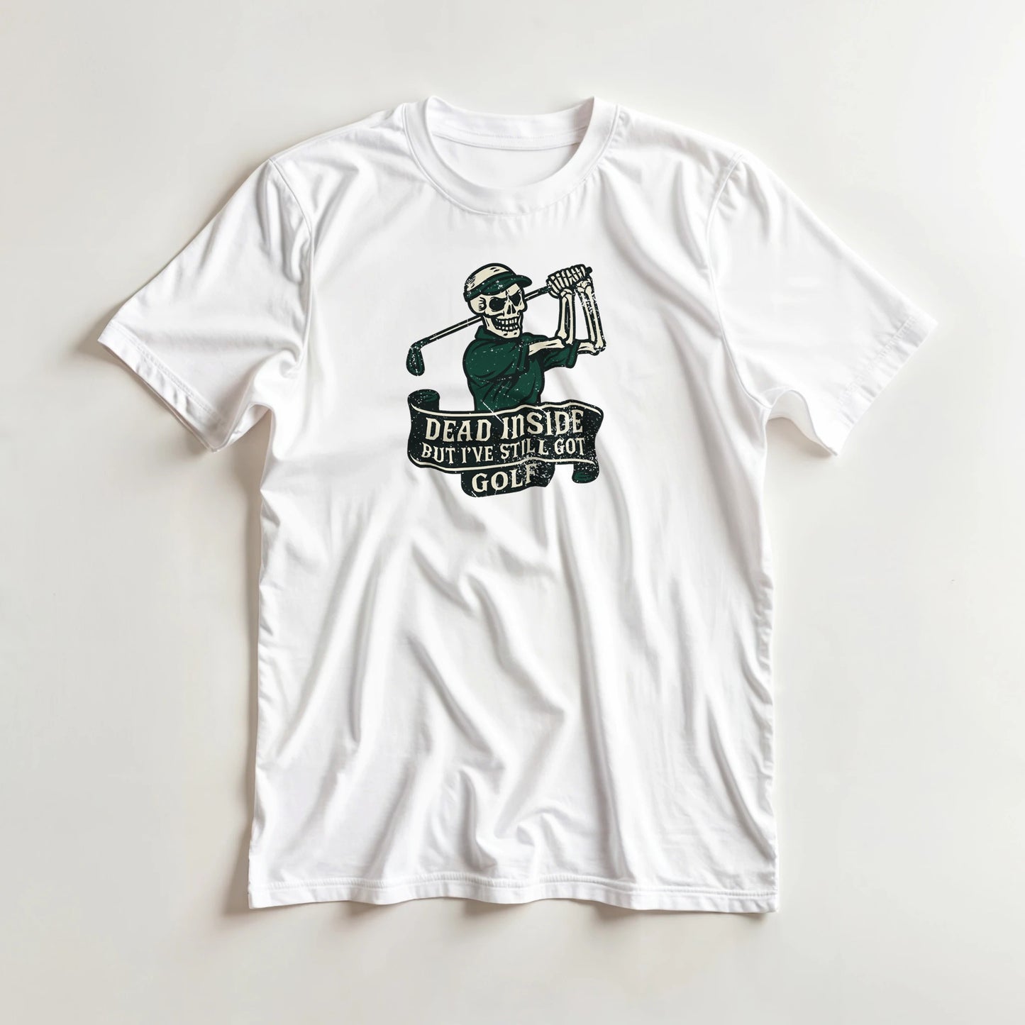Dead Inside T-Shirt in White lying on a plain floor. T-shirt is a unisex cut and 100 per cent cotton.