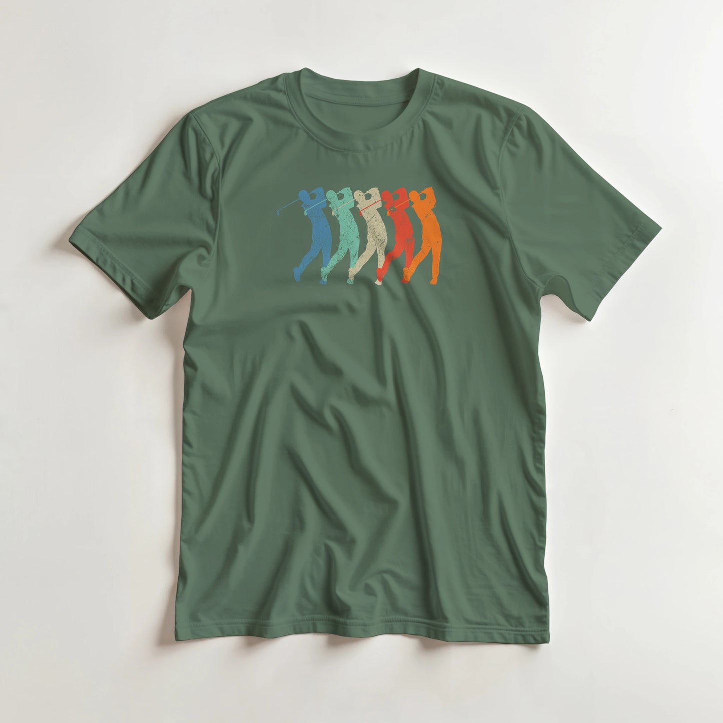 Golf Swing T-Shirt in Military Green lying on a plain floor. T-shirt is a unisex cut and 100 per cent cotton.