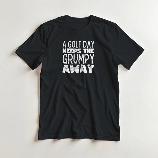 A Golf Day T-Shirt in Black lying on a plain floor. T-shirt is a unisex cut and 100 per cent cotton.