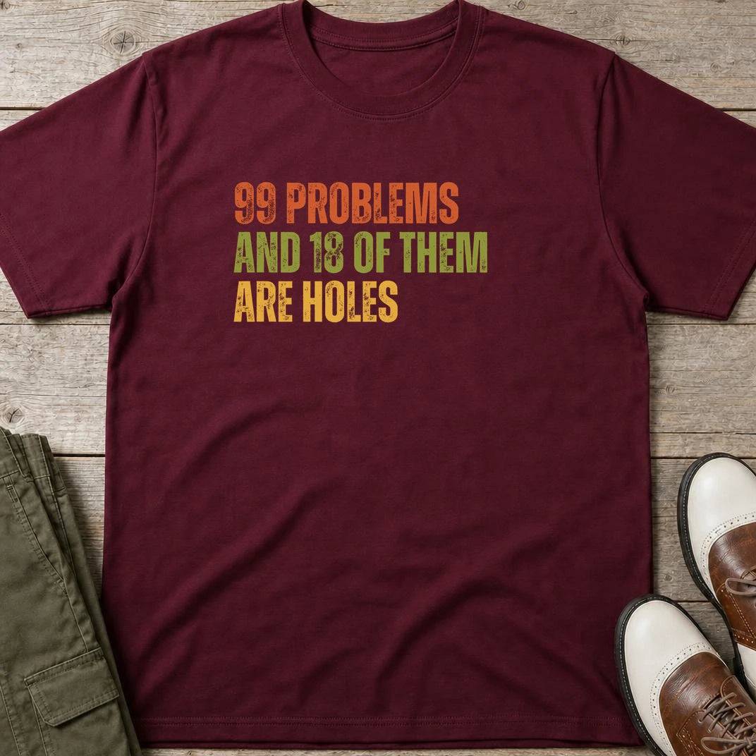 99 Problems T-Shirt in Maroon lying on a plain floor. T-shirt is a unisex cut and 100 per cent cotton.