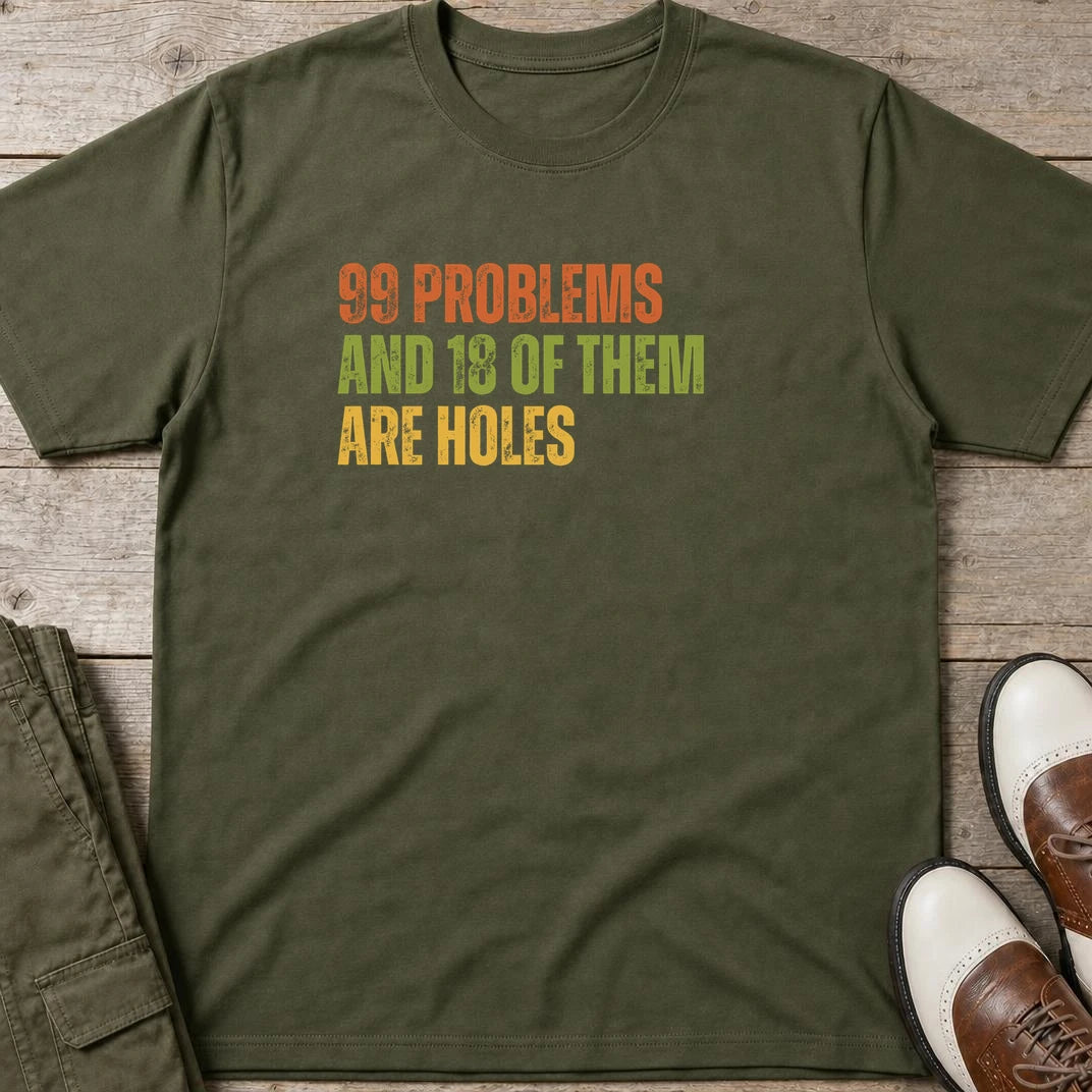 99 Problems T-Shirt in Military Green lying on a plain floor. T-shirt is a unisex cut and 100 per cent cotton.