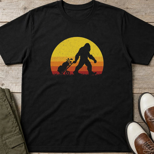 Bigfoot Trolley T-Shirt in Black lying on a plain floor. T-shirt is a unisex cut and 100 per cent cotton.