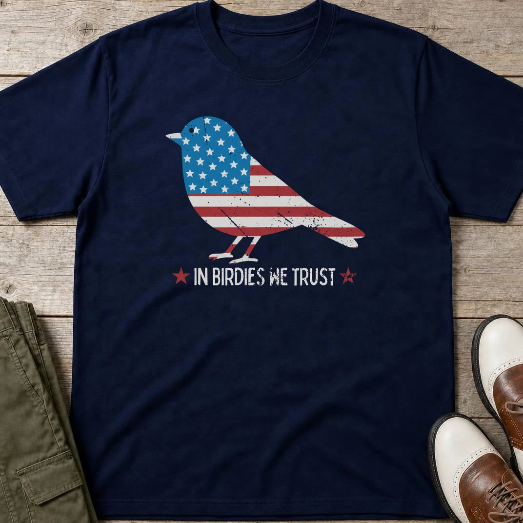 In Birdies We Trust T-Shirt in Navy lying on a plain floor. T-shirt is a unisex cut and 100 per cent cotton.
