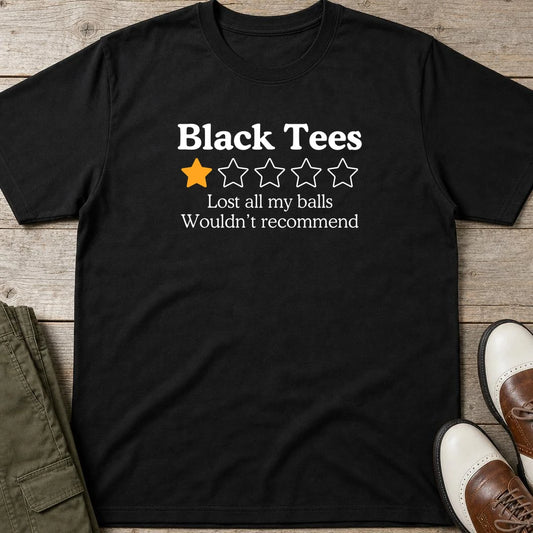 Black Tees T-Shirt in Black lying on a plain floor. T-shirt is a unisex cut and 100 per cent cotton.