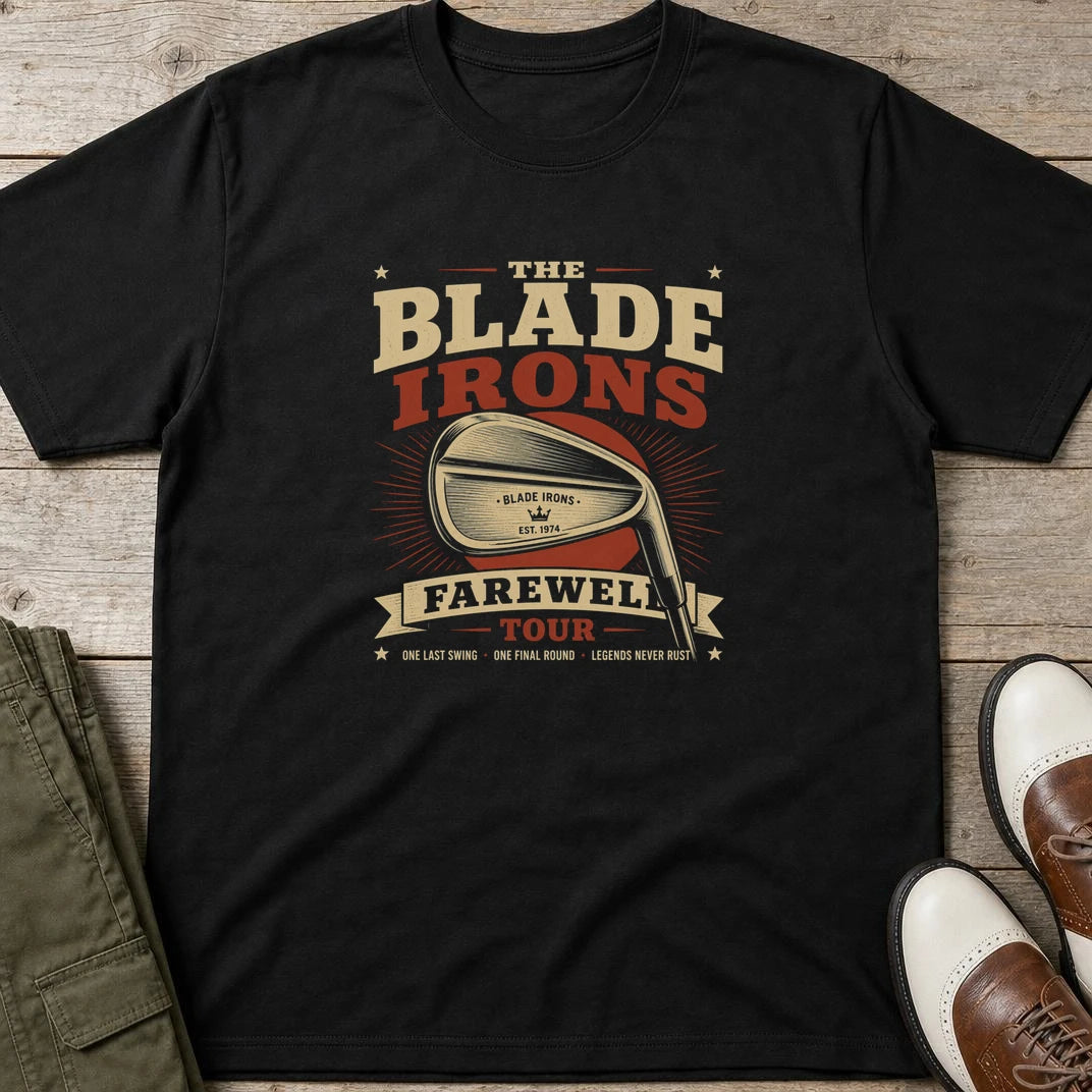 The Blade T-Shirt in Black lying on a plain floor. T-shirt is a unisex cut and 100 per cent cotton.