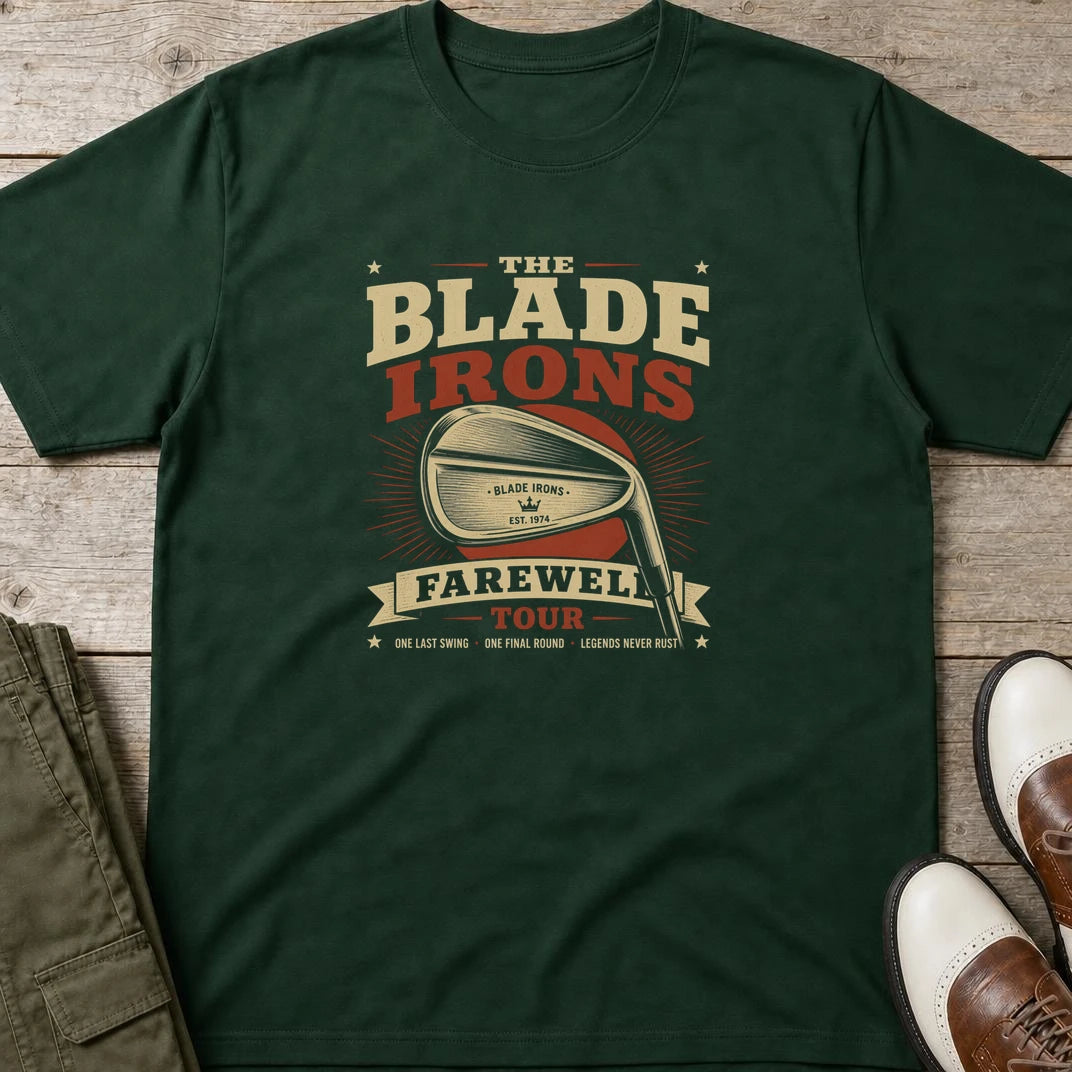 The Blade T-Shirt in Forest Green lying on a plain floor. T-shirt is a unisex cut and 100 per cent cotton.