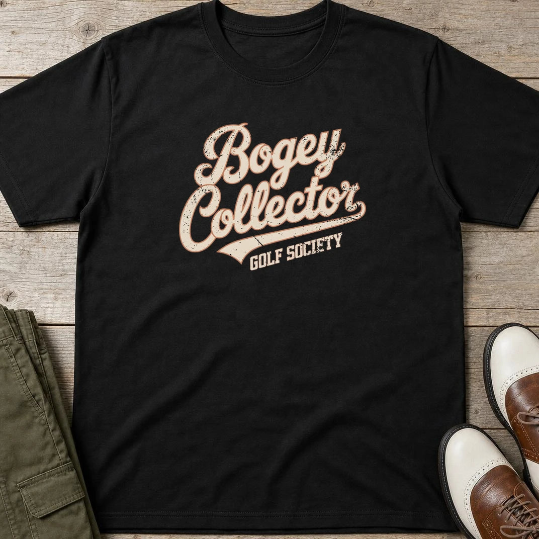 Bogey Collector T-Shirt in Black lying on a plain floor. T-shirt is a unisex cut and 100 per cent cotton.