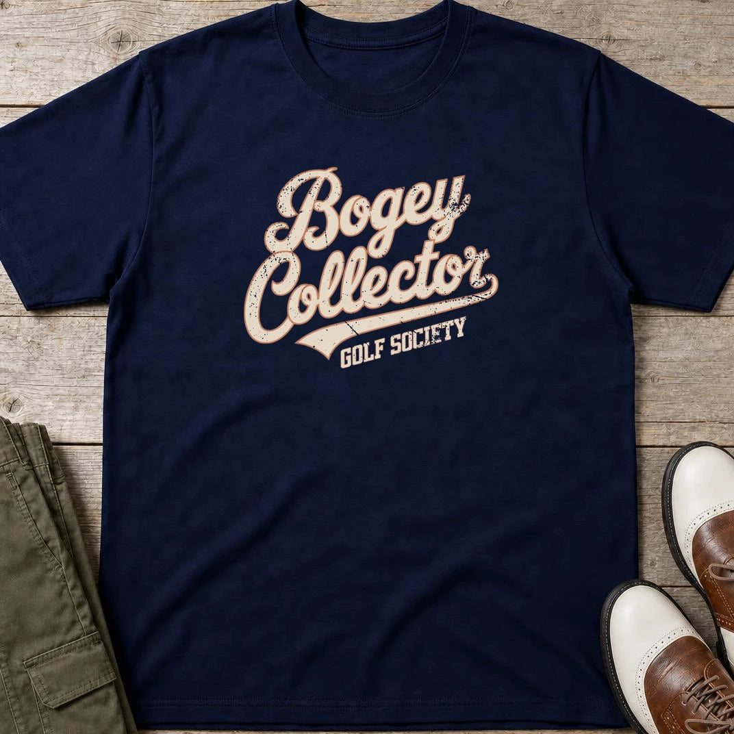 Bogey Collector T-Shirt in Navy lying on a plain floor. T-shirt is a unisex cut and 100 per cent cotton.