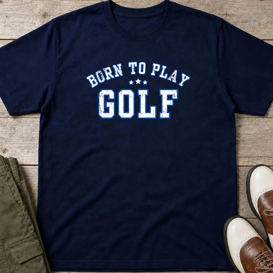 Born To Play Golf T-Shirt in Navy lying on a plain floor. T-shirt is a unisex cut and 100 per cent cotton.
