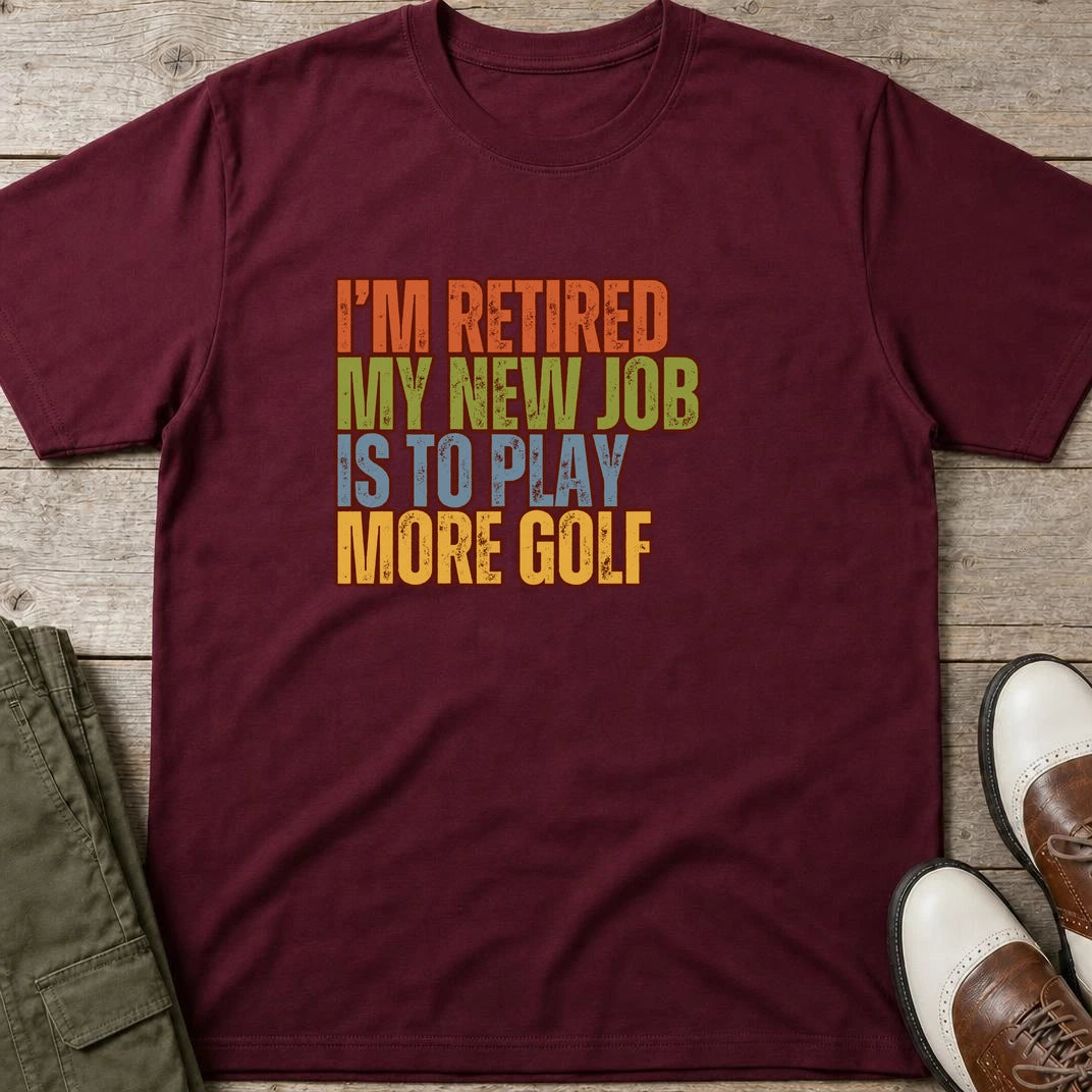 I'm Retired T-Shirt in Maroon lying on a plain floor. T-shirt is a unisex cut and 100 per cent cotton.