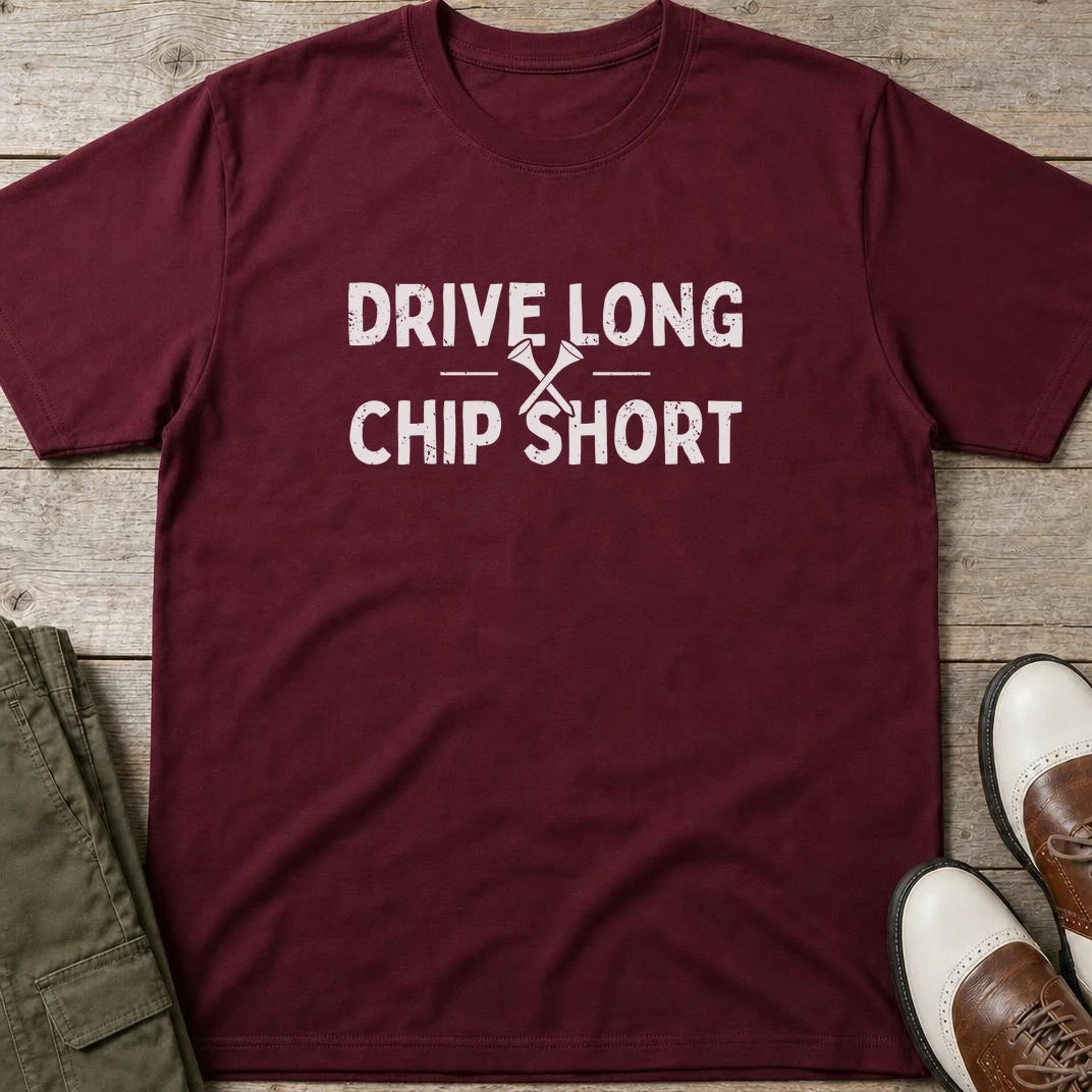 Chip Short T-Shirt in Maroon lying on a plain floor. T-shirt is a unisex cut and 100 per cent cotton.