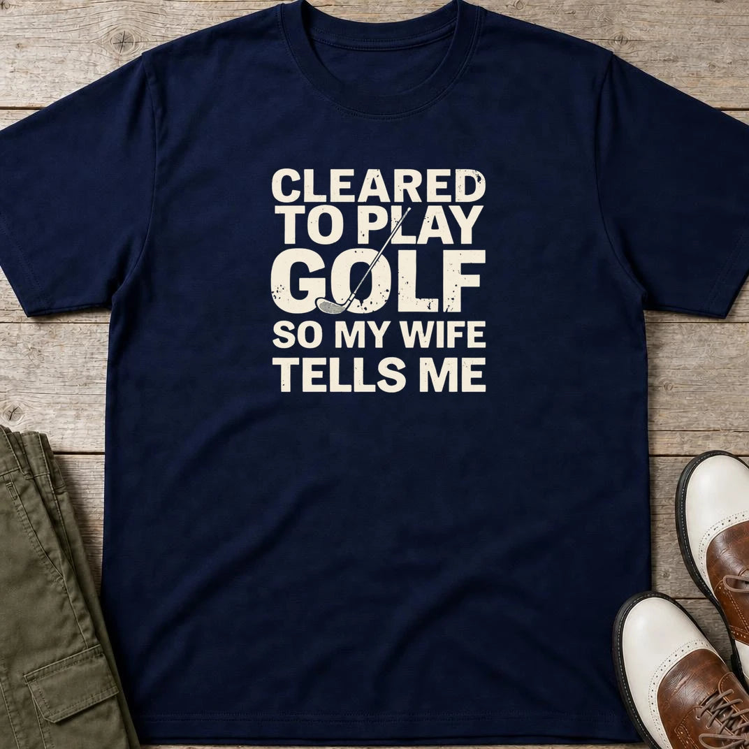 Cleared T-Shirt in Navy lying on a plain floor. T-shirt is a unisex cut and 100 per cent cotton.