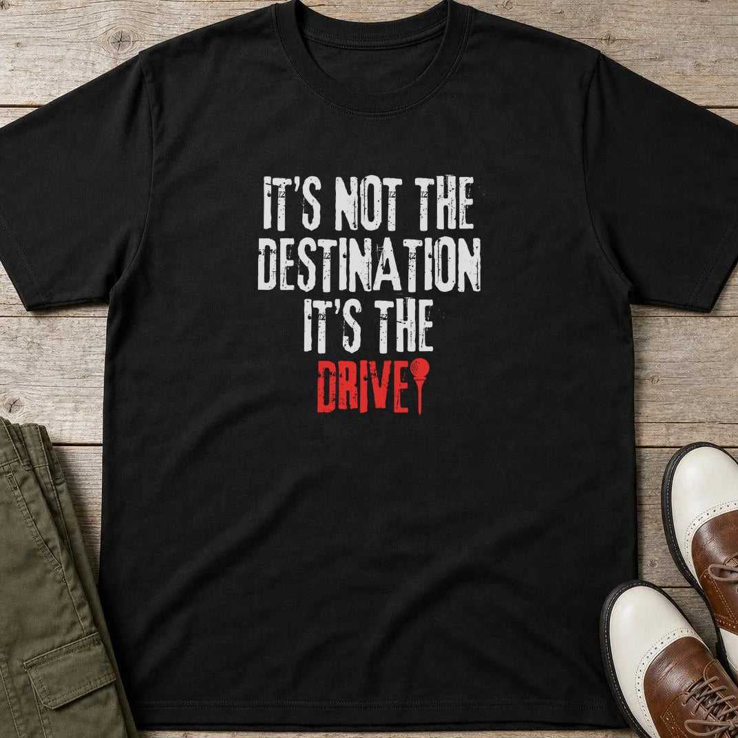 Destination T-Shirt in Black lying on a plain floor. T-shirt is a unisex cut and 100 per cent cotton.